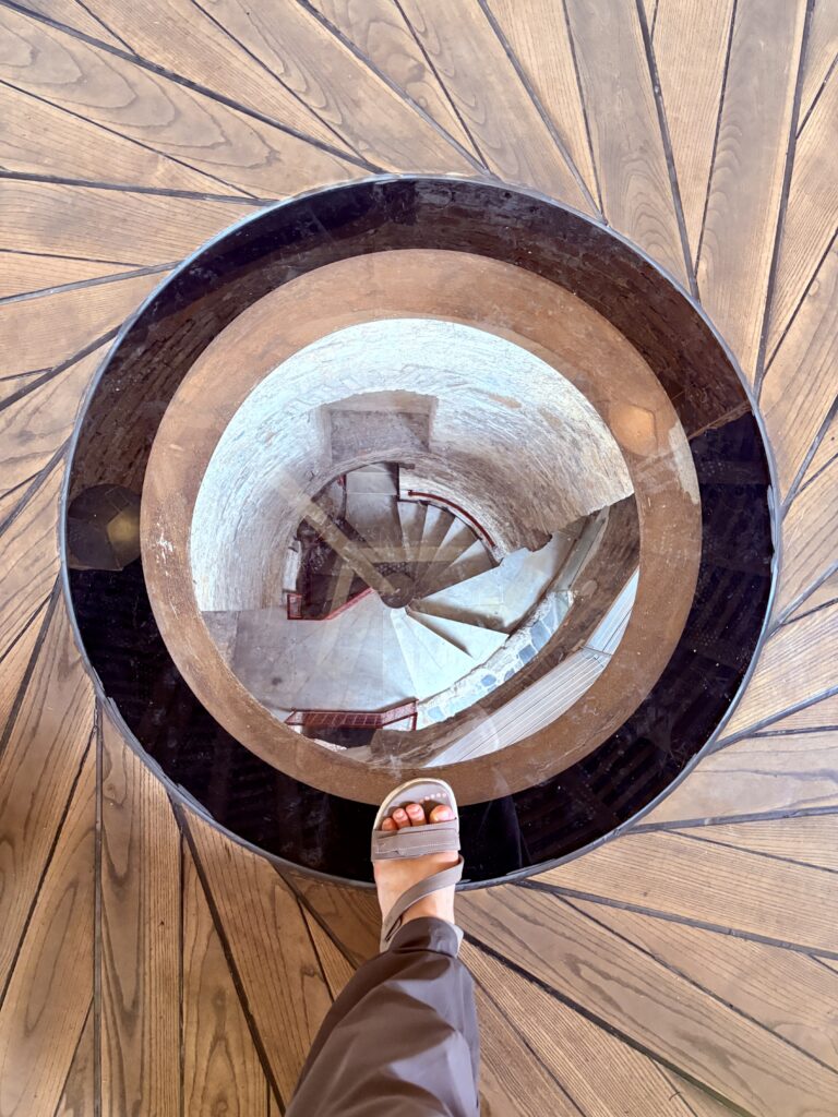 Looking through a hole in the ground